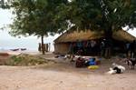 Village at Ferry, Senegal, Tree, Market Stall & Canoes