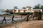 River Casomance, Senegal, Ferry, Men & Fishing Nets