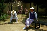 2 Men in Hats, Blossom, Korean Folk Village, Korea
