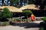 Sculpture Park - Thatched Roof & Girl in Red/Yellow, Chedju Island, Korea
