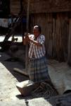 Woman Pounding Grain, Lake Toba, Simanindo, Indonesia - Sumatra
