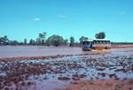 Near Burton Springs - Bus Coming Through Flood, Northern Territory, Australia