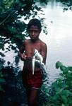 Island - Boy & Fish, Madang, Papua New Guinea