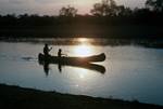 Evening on Thamalkane River: Canoe, Maun, Botswana