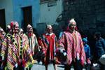 Banner & Men in Indian Costumes, Cuzco, Peru