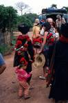 Getting off Bus, Woman & Red Pom Poms, Yao Village, Thailand