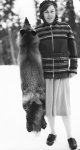 [Isobel Wylie Hutchison ? with] trapped fox in Arctic Canada