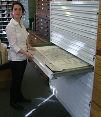 New Project Assistant, Heather Malcolm demonstrates new map storage units