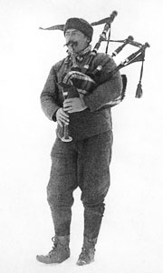 W.G. Burn Murdoch playing bagpipes in polar environment